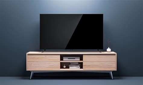 Download Smart Tv Mockup With Black Glossy Screen On Console In Living Room Stock Photo - Download Image ...