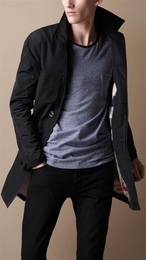No matter what year it is, during the cooler months black trench coats always remain in style. Burberry Brit Midlength Single Breasted Trench Coat in ...