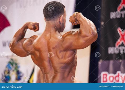 Male Bodybuilder Shows His Best Back Double Biceps Pose Editorial Photo