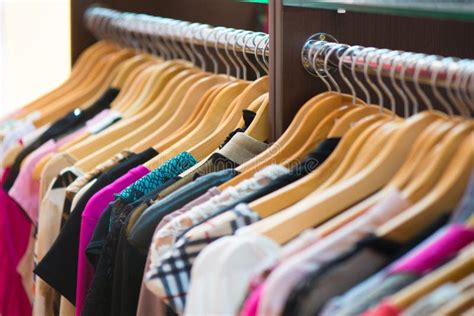 Variety Of Clothes Hanging On Rack Stock Image Image Of Cotton