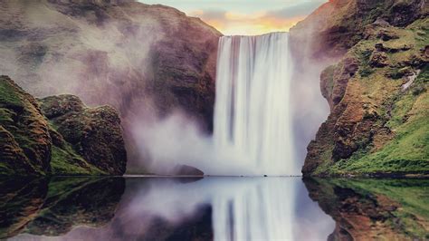 Skogafoss Waterfall View With Reflections At Summer Sunset Iceland