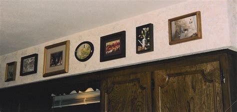 Paint soffits same color as cabinets to make them look taller. Kitchen Soffit Decorating Ideas