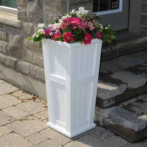 This elegant modern outdoor planter pot with its cylinder shape makes a very attractive impression in any space. Cape Cod Tall Planter by Mayne