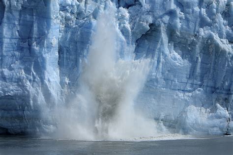 Large Chunk Of Ice Calving From Glacier The Splash From A Flickr