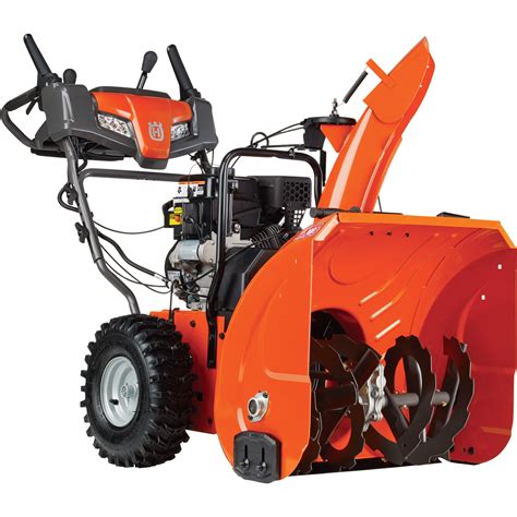 Clearing path will cut into large drifts with its 21 in. Husqvarna 27in. Electric-Start Dual-Stage Snow Blower — 254cc Engine | Northern Tool + Equipment