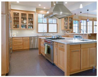 Maple kitchen cabinets with white granite countertops. Maple cabinets, solid legs. Grey? flooring (anyone ...