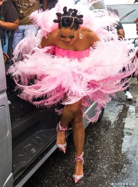 rihanna is pretty in pink as she attends the crop over festival in barbados — see the photos