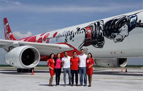 Does air asia have a direct affiliate program? From fight to flight: Air Asia launches UFC branded livery ...