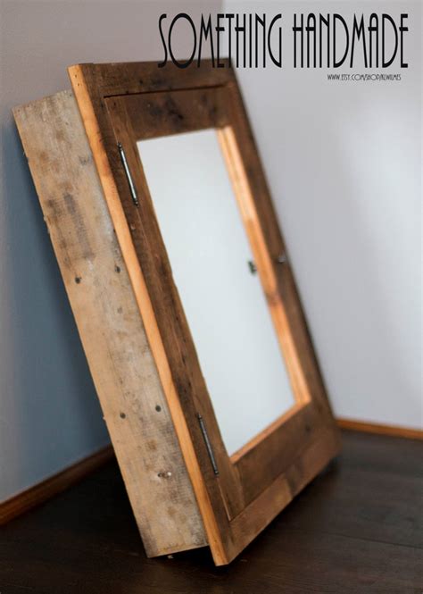 To make the recessed cavity for the cabinet, the contractor drilled a 3 observation hole into the wall and examined the area behind it with a flashlight, looking for obstructions like plumbing lines or electrical wires. rustic Recessed barn wood Medicine cabinet with mirror ...