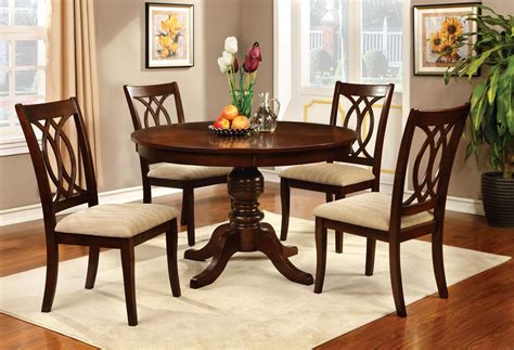 The wyndmere collection is a traditional style dining room set that features a dboule pedestal base. Jawdat Brown Cherry Round Dining Table Set | Round Dining Sets