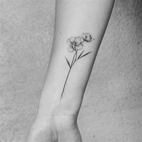 Awesome Small Flower Wrist Tattoo Free