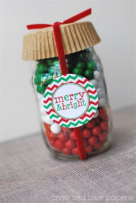 Jar decorated with wrapping paper and ribbons | source. Top 10 Mason Jars Christmas Decorations For Your Cookies ...