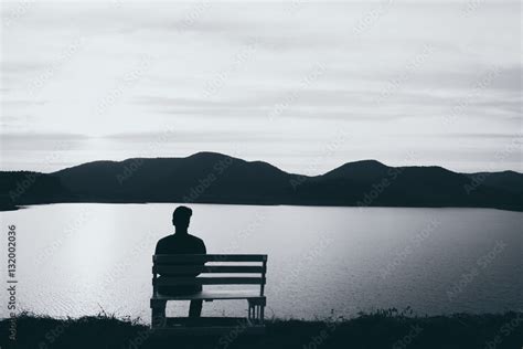 The Silhouette Of Boy Sitting Alone Concept Of Lonely Sad Alone Person Space Alone And
