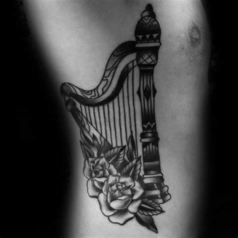 A golden harp with silver strings has been an irish symbol from as early as the 13th century. 60 Harp Tattoo Designs For Men - Musical Instrument Ink Ideas