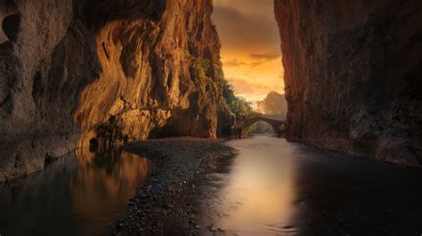 2560x1440 River Canyon Rocks Gorge Cliffs Nature 5k 1440p Resolution