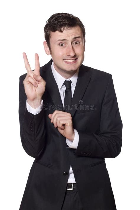 Intimidated Businessman Showing The Peace Sign Stock Photo Image Of