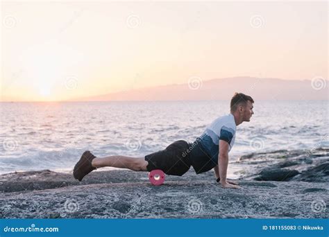 Man Doing Self Massage Of The Body With A Roll Fascia Training Stock Image Image Of