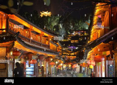 Busy Lijiang Old Town Unesco World Heritage Site At Night With Lion