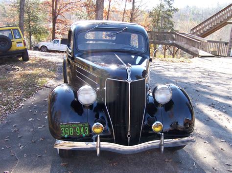 Maybe you would like to learn more about one of these? Antique 1936 Ford Tudor Touring Sedan 36