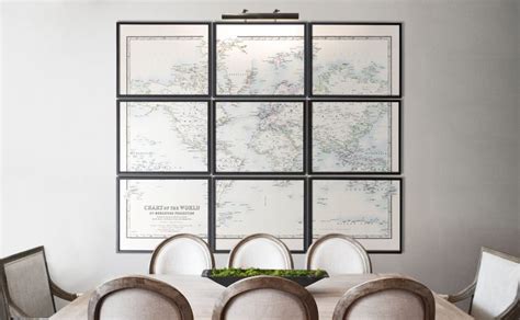 A Dining Room Table With Chairs And A Large Map Hanging On The Wall