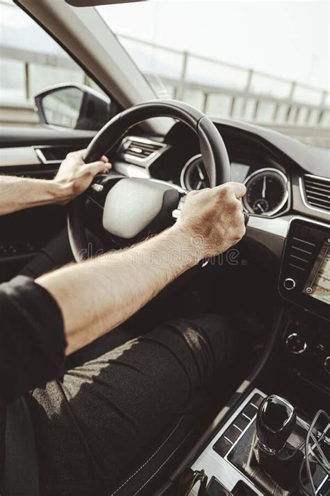 Male Hands On A Car S Steering Wheel Stock Image Image Of Closeup