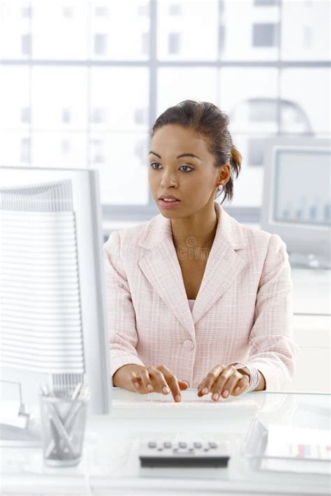 Black Ethnicity Woman Sitting At Computer Laptop Desk Typing