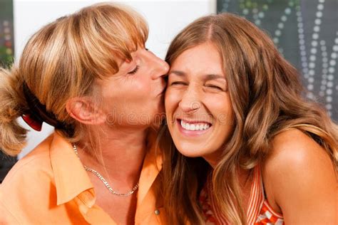 Mother Is Kissing Her Daughter Stock Image Image Of Mother Sitting