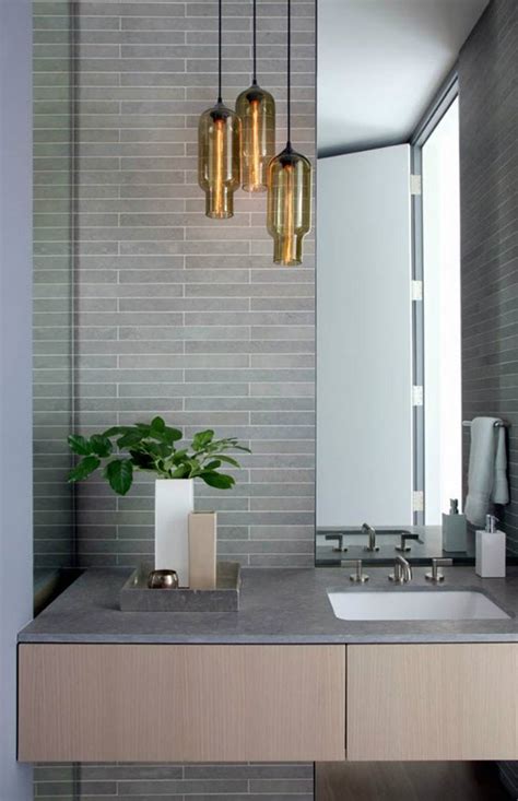 Bathrooms without natural light from a window are likely to need more or brighter long vanities might require multiple fixtures, and double sinks look best with a separate fixture over each. Bathroom light fixtures - 25 contemporary wall and ceiling ...