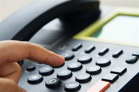 Close Up Hand Dialing Telephone Stock Photo Download Image Now Istock