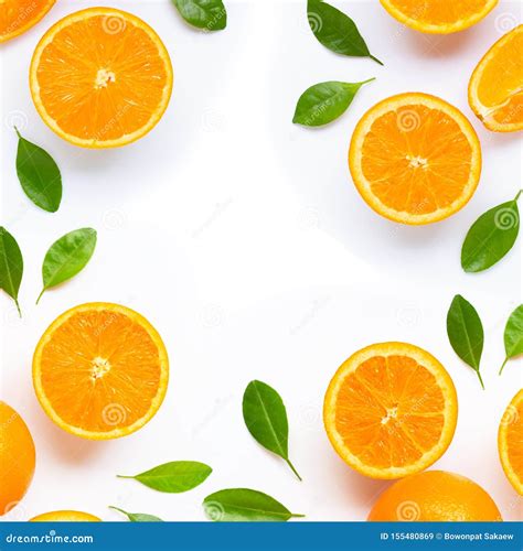 Frame Made Of Fresh Orange Citrus Fruit With Leaves Isolated On White