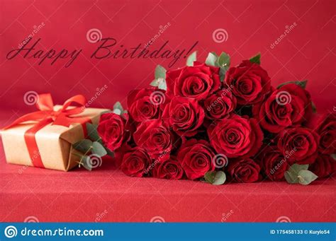 Beautiful Bouquet Of Red Roses With T Box On The Red Background