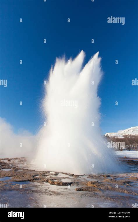 Eruption Of Strokkur Fountain Geyser In The Geothermal Area Beside The