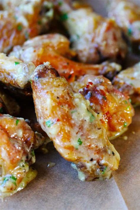 Slathered in melted butter, chopped garlic, parsley, and a whole lot of. Garlic Parmesan Chicken Wings - Eating European