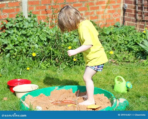 Child Playing In A Sandpit Stock Image Image Of Play Small 39916421