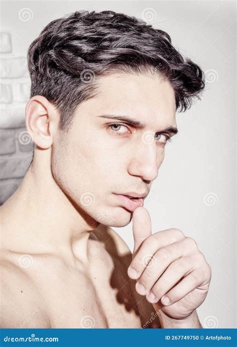 Handsome Young Manand X27s Headshot Against White Wall Stock Photo