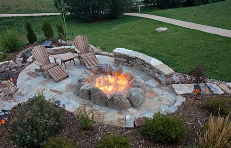 Overhead View Of Oval Flagstone Patio With Large Fire Pit Created With