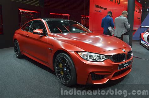 Check prices and deals, find your nearest dealership in the us. BMW M4 in Frozen Red metallic front three quarter left at iAA 2015