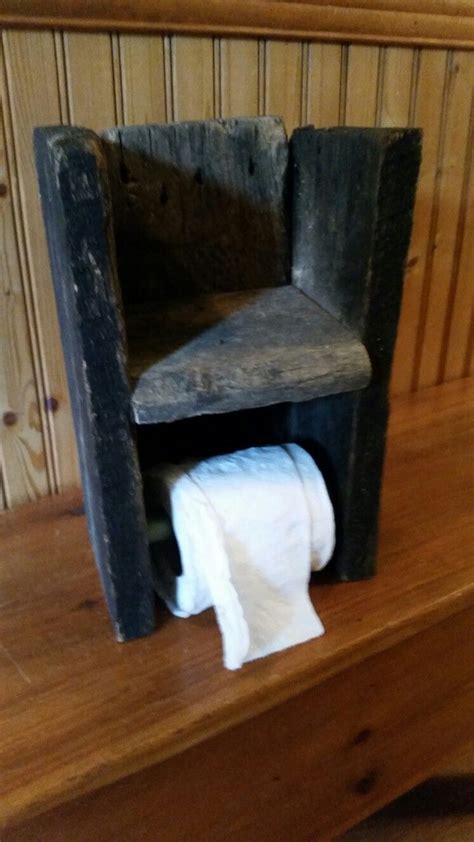 It should help get your inspiration rolling. Rustic toilet paper holder from reclaimed fence boards ...