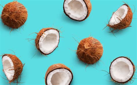 Coconut Pattern On A Blue Background Half And Whole Coconuts