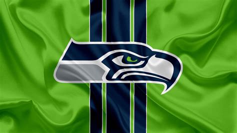 / 20+ free psd logos. Seattle Seahawks Logo In Green Textile Background HD ...