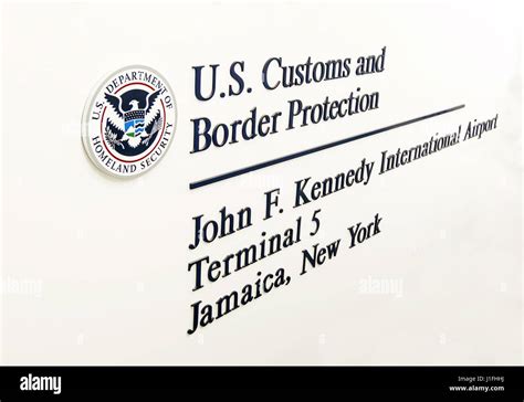 Us Customs And Border Protection Sign On A Wall Of Jfks Terminal 5 In
