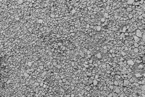 Background With Gravel Texture And Pieces Of Stone In Gray Color Stock