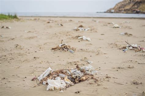 Spilled Garbage On The Beach Empty Used Dirty Plastic Bottles Environmental Pollution Stock