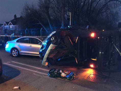Pictured Woman Cut Free As Two Vehicles Overturn In Three Car Smash In