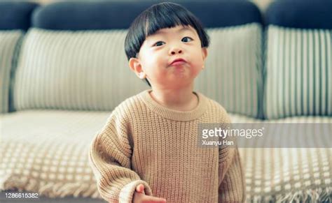 Baby Making Funny Faces Photos Et Images De Collection Getty Images