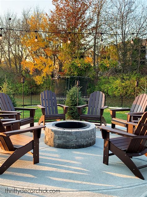 our round patio fire pit with adirondack chairs thrifty decor chick thrifty diy decor and