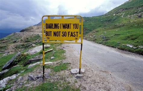 The Worlds Most Peculiar Road Signs 14 Pics