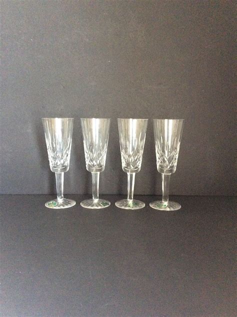 Set Of 4 Vintage Waterford Crystal Lismore Fluted Champagne Etsy Waterford Crystal Lismore