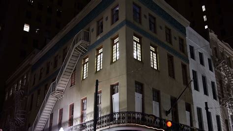 Typical New York Style Apartment Building Establishing Shot At Night