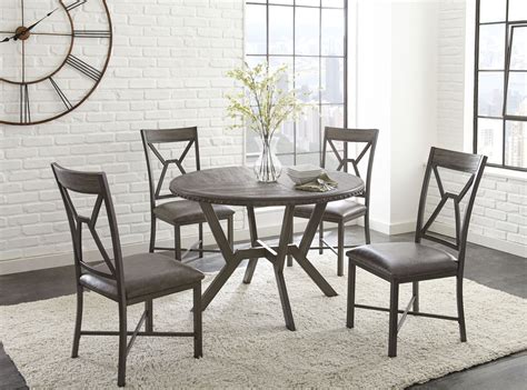 Comes with two 18 leaves and extends to 118 long. Alamo Gray Round Dining Room Set, AL450T, Steve Silver